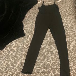 a black catsuit